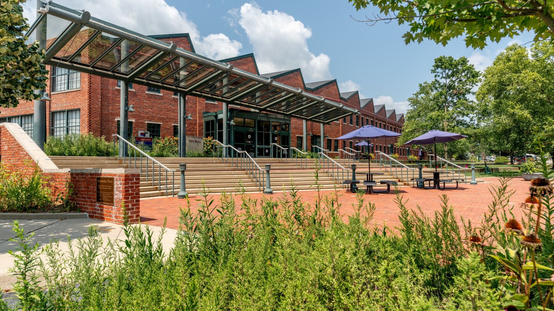But city officials said the wall is part of private property, a distinction that matters now that the Black Lives Matter mural has been removed and replaced. In clarifying the situation, the city pointed to a longer history tied to the site, one that stretches back across decades of public art and community memory.