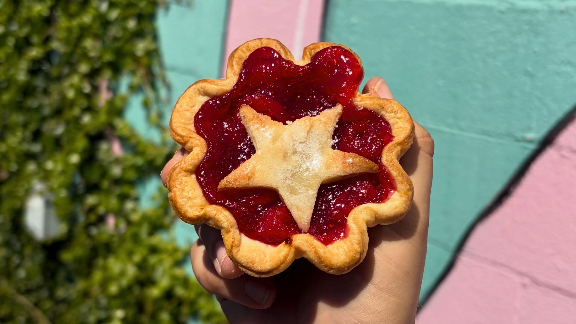 The shop specializes in individual pies—small enough for one person to claim as a personal dessert, substantial enough to feel like a real treat. A recognizable flamingo mural adds a playful note to the setting. Come for fruit pie, stay long enough to notice that this is also a place with savory lunches, coffee and a pastry case full of competing temptations.